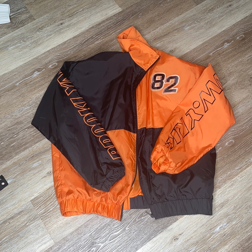 Orange and black wind breaker